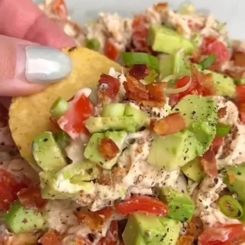 Delicious BLT chicken salad with bacon, lettuce, tomatoes, and chicken.