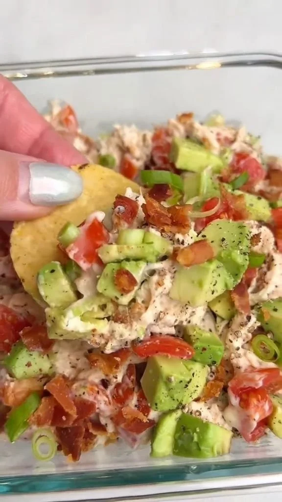 Delicious BLT chicken salad with bacon, lettuce, tomatoes, and chicken.