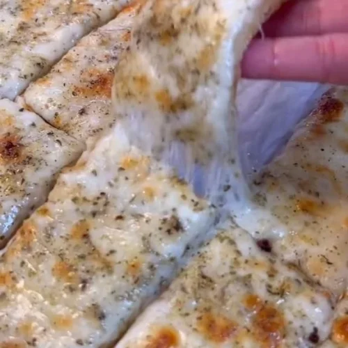 Easiest & Cheesiest Bread 2 Loaf of the easiest and cheesiest bread fresh out of the oven