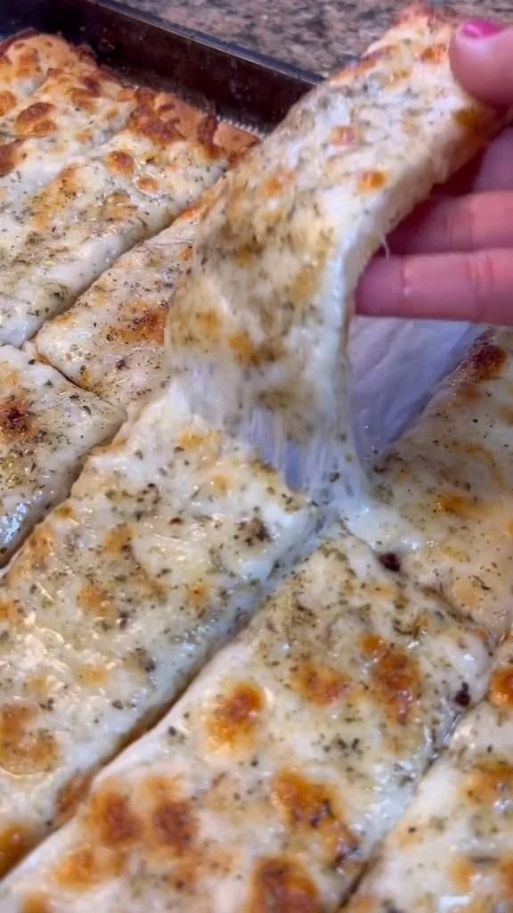 Loaf of the easiest and cheesiest bread fresh out of the oven