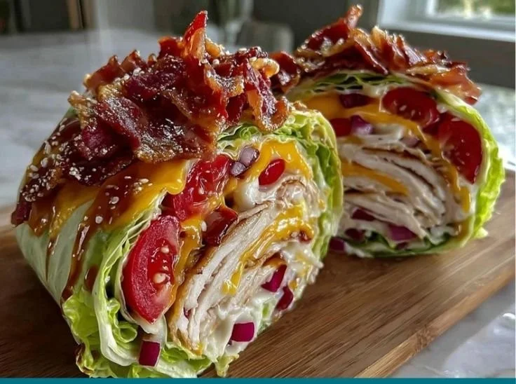 Fresh keto turkey club lettuce wraps with turkey, bacon, and avocado