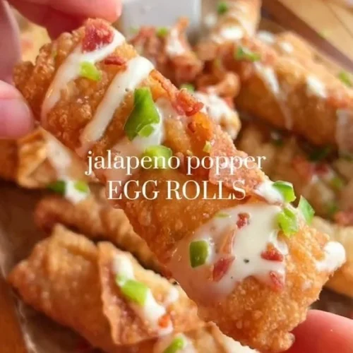 Jalapeno Popper Egg Rolls 2 Crispy jalapeno popper egg rolls filled with cheese and spices
