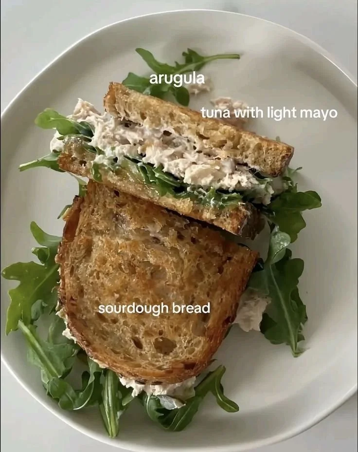 Assorted healthy snacks including fruits, nuts, and veggie sticks