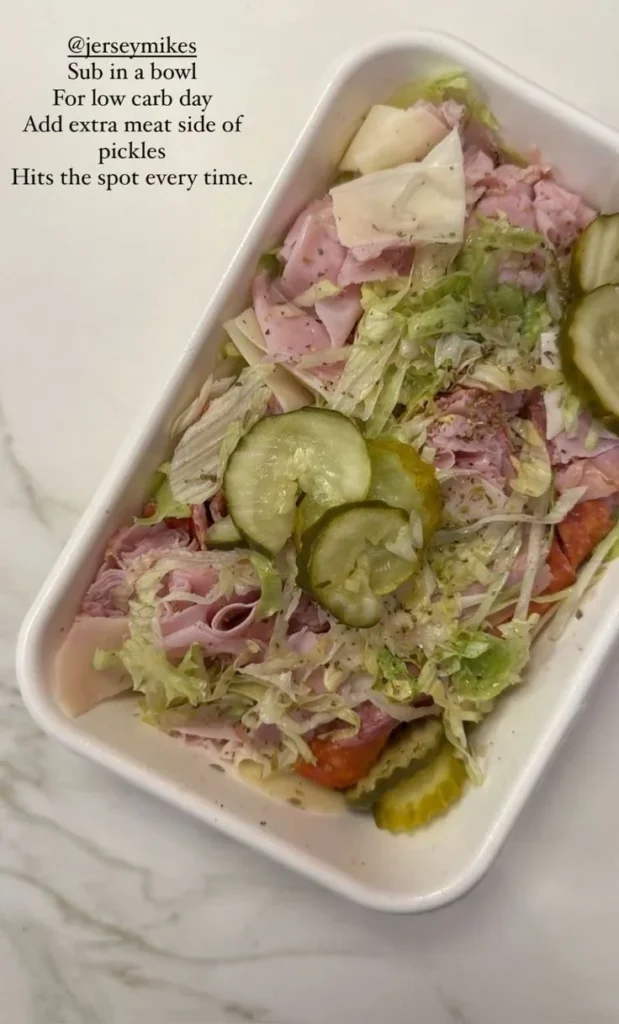 Variety of healthy snacks displayed on a table, including fruits and nuts.
