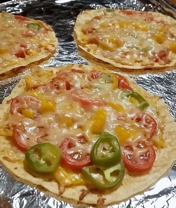 Easy keto recipes including homemade pizza for low-carb meals.
