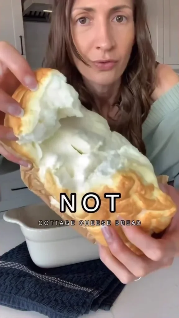 Sliced 0-Carb Yogurt Bread on a cutting board with toppings