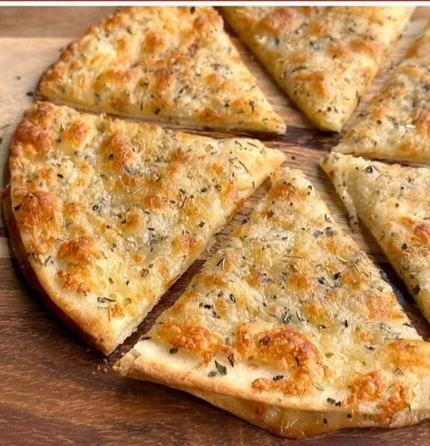 Air Fryer Garlic Bread served on a plate, golden and crispy.