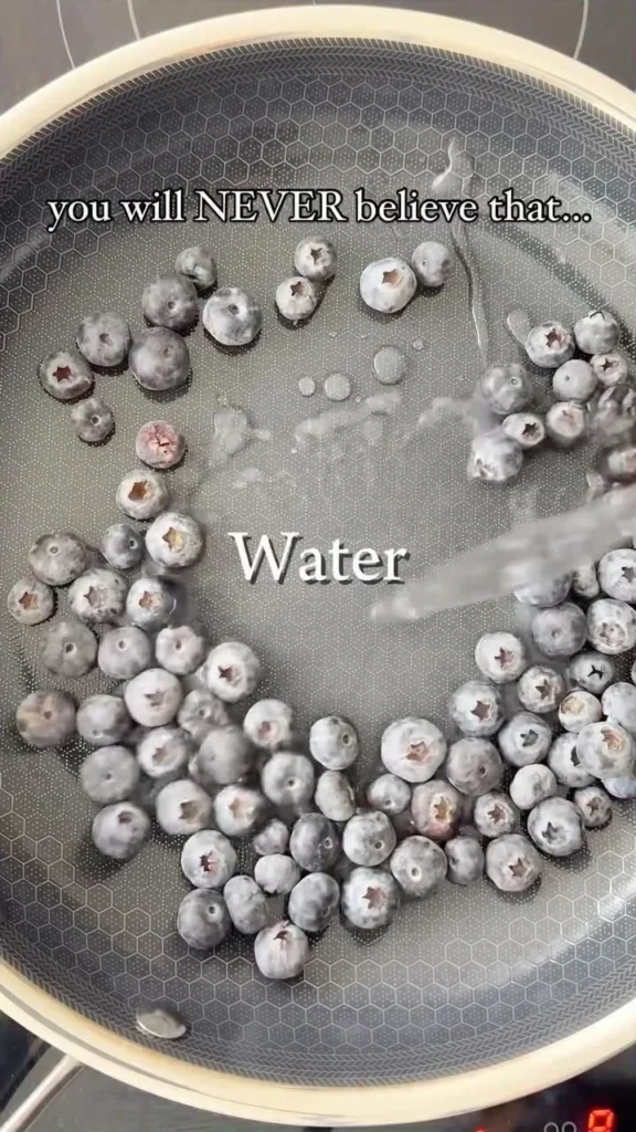 Freshly baked blueberry oat bars on a wooden table