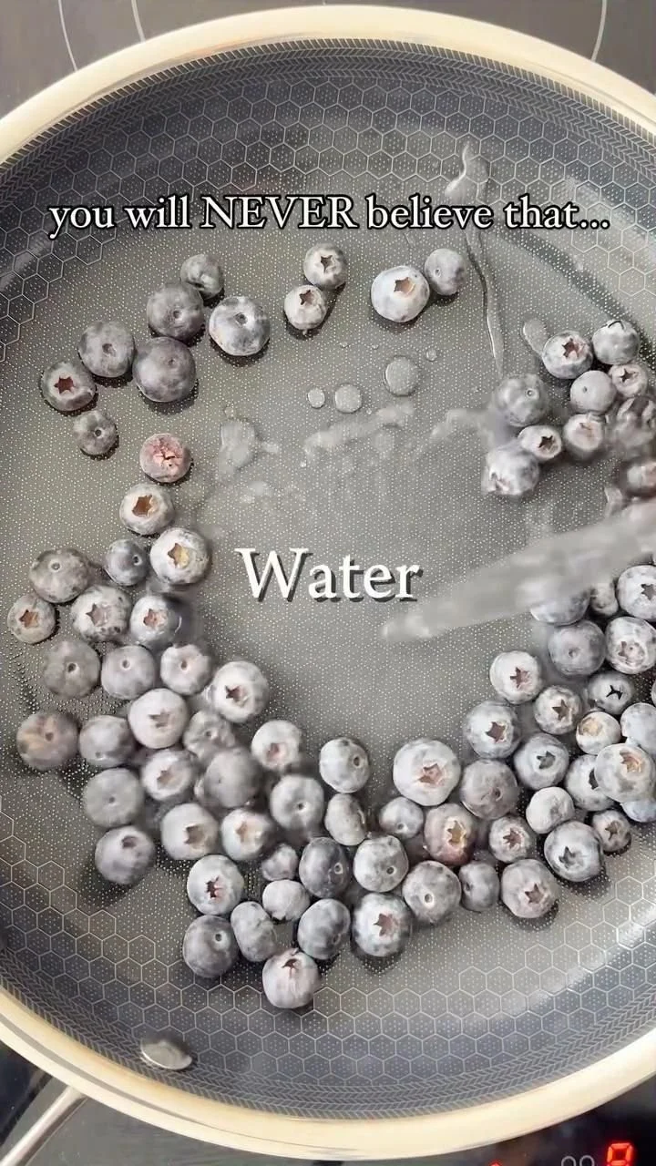Freshly baked blueberry oat bars on a wooden table