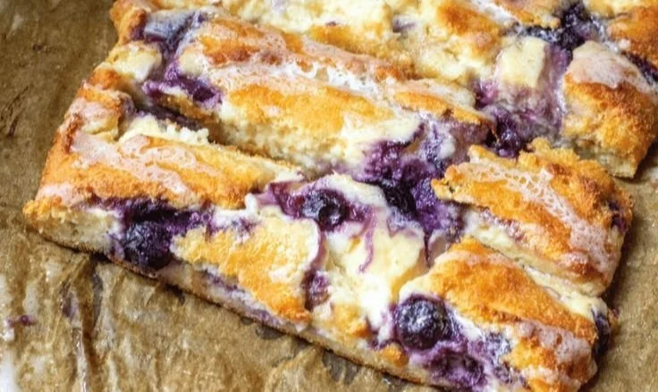 Braided Blueberry Cream Cheese Keto Danish on a plate with fresh blueberries