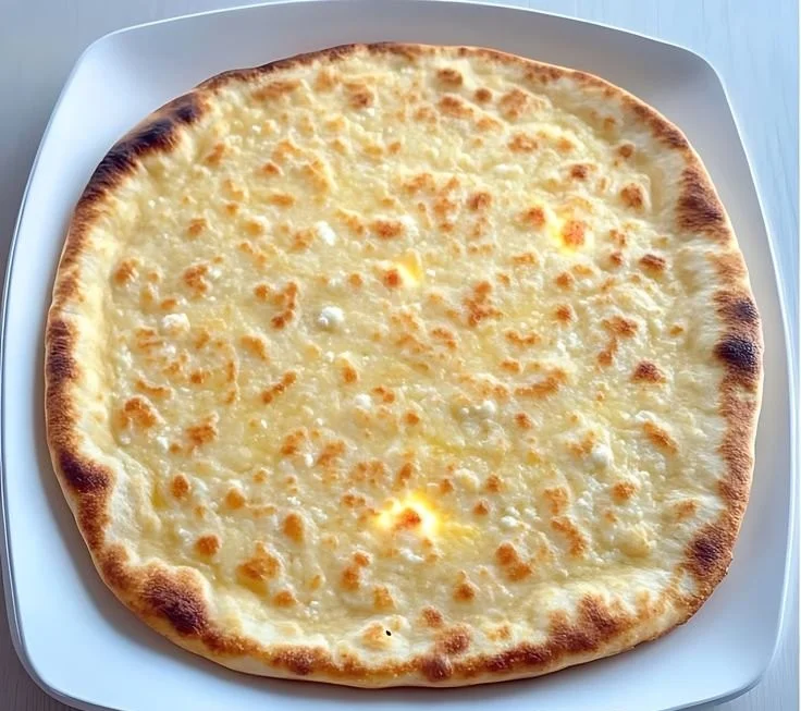 Homemade Cottage Cheese Flatbread topped with herbs and spices