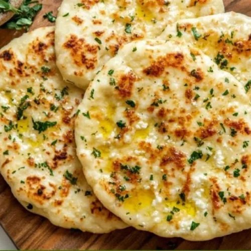 Homemade Cottage Cheese Flatbreads topped with herbs and spices.