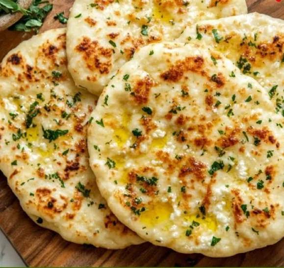 Homemade Cottage Cheese Flatbreads topped with herbs and spices.