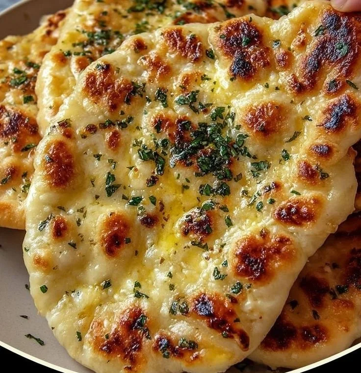 Cottage Cheese Garlic Skillet Naan served with herbs and spices