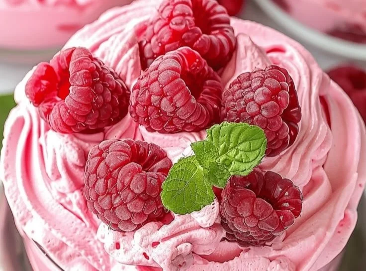 Delicious cottage cheese raspberry mousse dessert in a glass