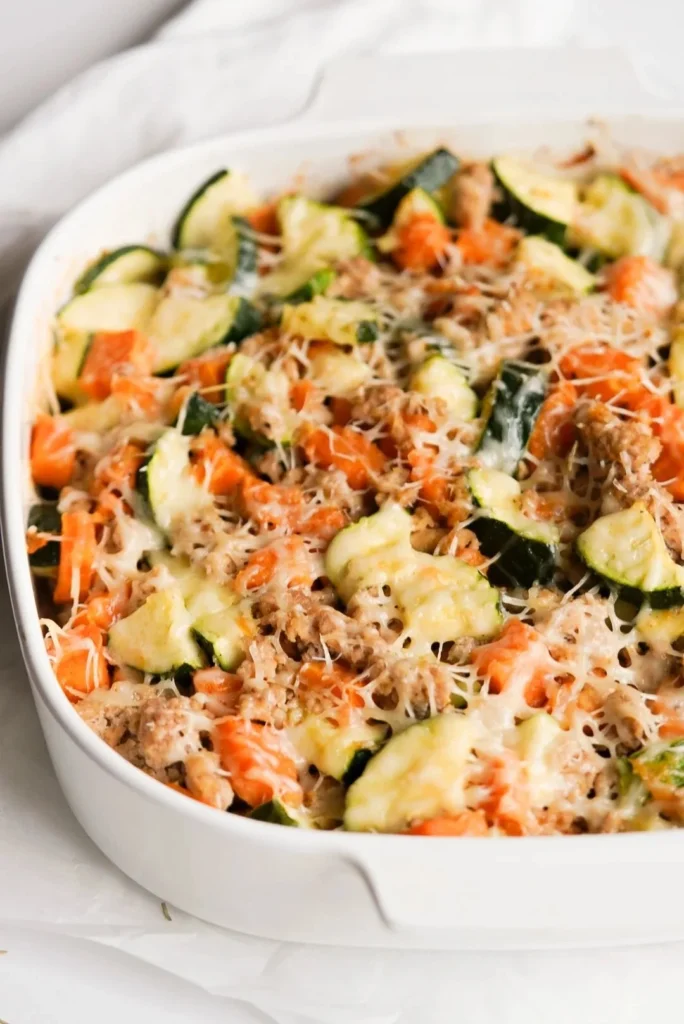 Ground Turkey Sweet Potato Bake topped with herbs in a casserole dish