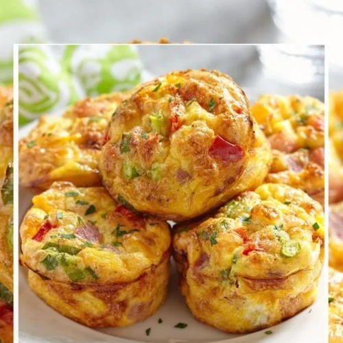 Healthy egg muffins baked with fresh vegetables and herbs.