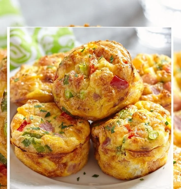 Healthy egg muffins baked with fresh vegetables and herbs.