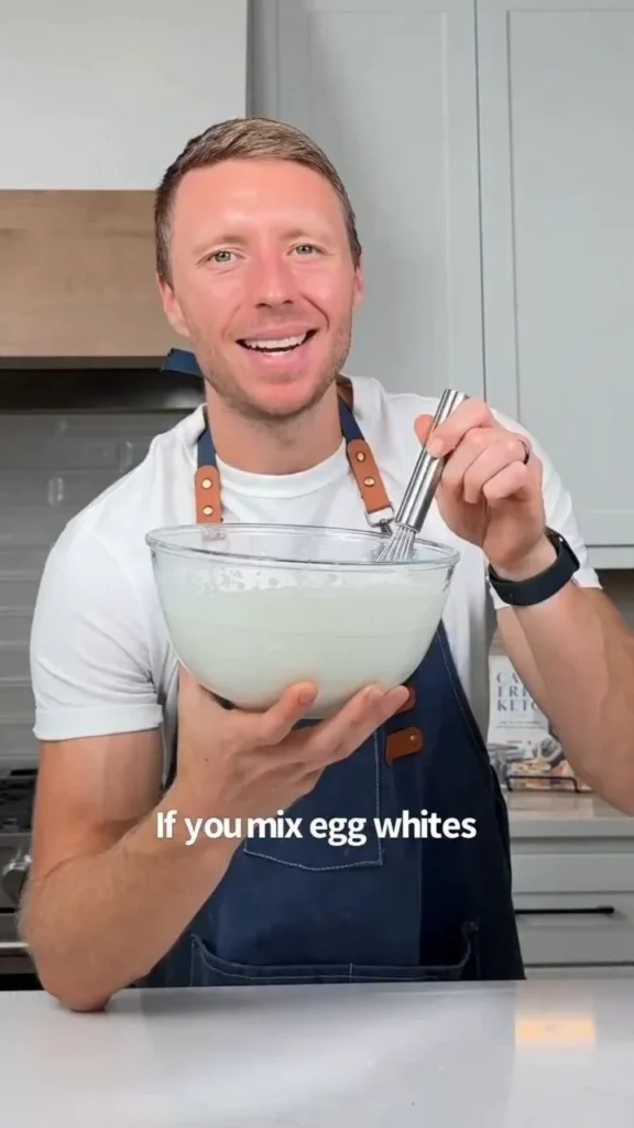 Delicious high protein dessert topped with fresh berries and chocolate drizzle