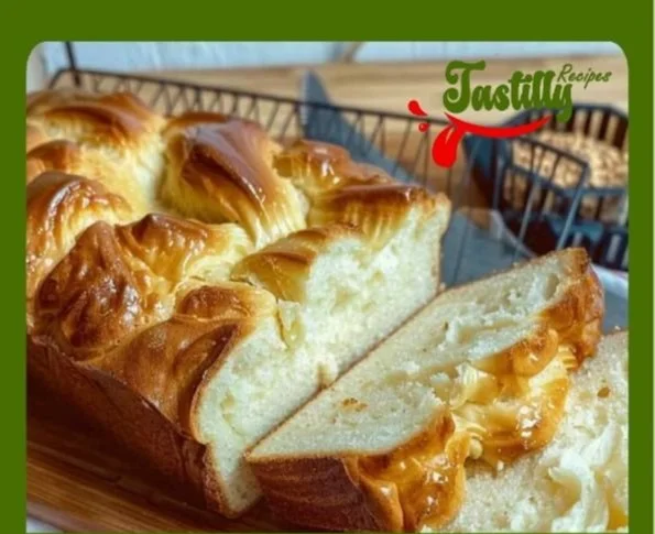 Loaf of high-protein egg white bread on a wooden cutting board