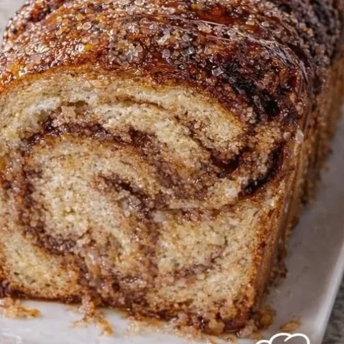 Pin by Linda Ketchum on Recipes in 2026 | Sweet Bread Recipes, Recipes, Bread Maker Recipes 2 Delicious sweet bread recipes showcased in a colorful recipe book.